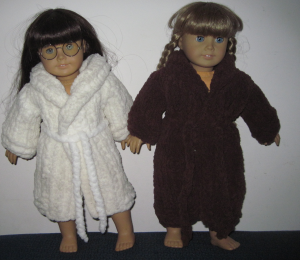 two American Girl Dolls in bathrobes
